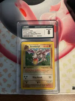 Pokemon Aerodactyl Holo Rare 1st Edition Prerelease CGC 8 - Image 1