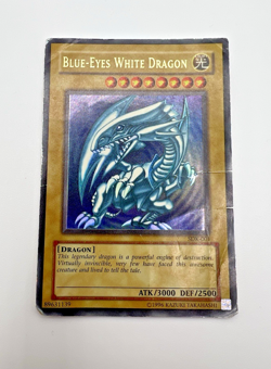 Vintage Yu-Gi-Oh! Blue-Eyes White Dragon (SDK-001 Unlimited Ultra Rare) DAMAGE - Image 1