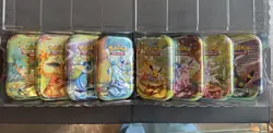 Prismatic Evolutions Tins - Set of 8 - Tins, Art Cards, and Coins only- No cards - Image 2