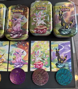 Prismatic Evolutions Tins - Set of 8 - Tins, Art Cards, and Coins only- No cards - Image 3