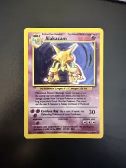 Pokemon TCG Alakazam Base Set Holo Card 1/102 HEAVY PLAYED - Image 1