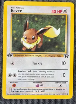 EEVEE 55/82 COMMON TEAM ROCKET POKEMON 1ST EDITION MP - Image 1