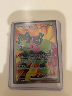 Pokemon Okidog ex 082/064 Card w/ Sleeve and Top Loader - Image 1