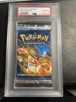 PSA 8 Pokemon TCG Base Set Unlimited Booster Pack Charizard Artwork WOTC 1999 - Image 1