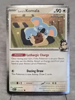 Larry’s Komala 175/217 Cosmo Holo Promo Ascended Heroes Pokemon TCG NM B2 - Image 1