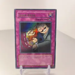 Yu-Gi-Oh! Dark Bribe Card DLG1-EN106 Ultra Rare - Image 1