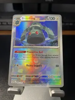 Bronzong 067/131 Master Ball Reverse Holo Pokemon SV: Prismatic Evolutions NM - Image 1