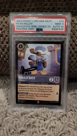 Disney Lorcana Promo Card Donald Duck signed Designer Ryan Miller PSA 9 Mint - Image 1