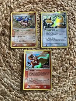 3 Pokemon Cards-Blaziken 5/108; Ampharos 1/101; Hitmontop 26/115 (foil Shiny) - Image 1