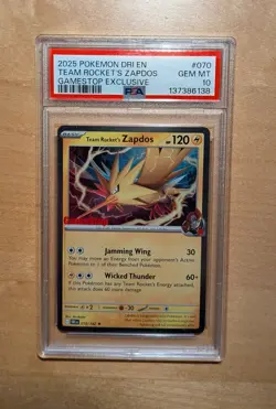 PSA 10 Team Rocket’s Zapdos 070/182 GameStop DRI Promo Holo 2025 Pokemon Card - Image 1