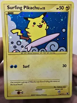 Pokemon 2009 Surfing Pikachu 114/111 Rising Rivals Holo - Image 1