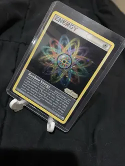 Pokemon Card Rainbow Energy 81/92 Reverse Holo LP Plus Hard Case - Image 1