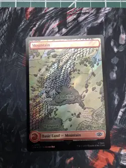 #719 Mountain (Surge Foil) Universes Beyond LOTR Tales of Middle-earth Land - Image 1