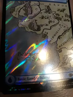Island (0716) (Surge Foil) Universes Beyond: the Lord of the Rings: Tales of... - Image 1