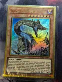 YuGiOh Danger! Nessie! Gold Rare 1st Edition MGED-EN019 NM - SEALED - Image 1