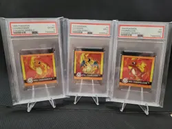 PSA 9 CHARIZARD PSA 7 CHARMELEON PSA6 CHARMANDER 1999 POKEMON MERLIN STICKER SET - Image 1