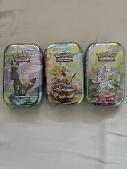 Pokemon TCG Prismatic Evolutions Mini Tins X3 Factory Sealed - Image 1