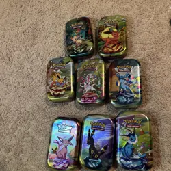 Pokemon Prismatic Evolutions 8x Official Empty Mini Tins Set Display | No Packs - Image 1