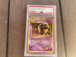 Pokemon 1999 Pocket Monsters Japanese Gym 2 Sabrinas Alakazam #65 Holo PSA NM 7 - Image 1