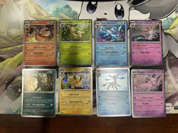Pokemon - Prismatic Evolutions - Costco Mini Tin Cosmo Promos 8 Umbreon Sylveon - Image 1