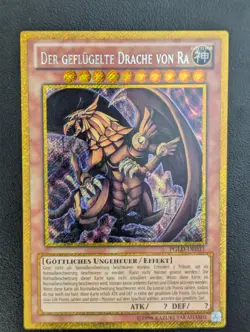 Der Geflugelte Drache von Ra PGLD-DE031 Gold Secret Rare Deutsch NM Yugioh - Image 1
