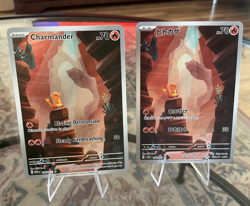 Charmander 168/165 /English and Japanese version NM! 2 cards - Image 1