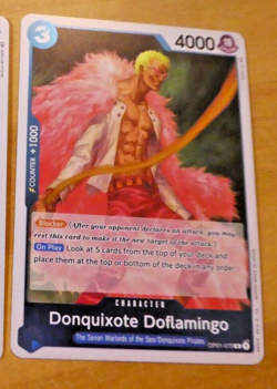 ONE PIECE ENGLISH CARD GAME HOLO CARTE Donquixote Doflamingo OP01-073 EN MINT - Image 1