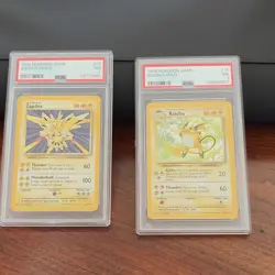 Pokemon 1999 Game PSA Graded Holo Zapdos #16/102 & Raichu #14/102 Cards - Image 1