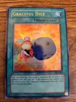 Grateful Dice Limited Edition - Prismatic Secret Rare Holo Foil Yugioh Card Card - Image 1