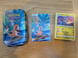 Pokemon Tin With 50 Common/Uncommon Cards - Image 1