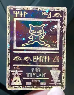 Preowned Pokemon TCG Base Set Holo Charizard, Holo Raichu, And Holo Ancient Mew - Image 2