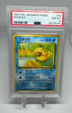 1997 P.M. Japanese Fossil Psyduck #54 PSA 8 Near Mint-Mint Vintage Pokemon TCG - Image 1