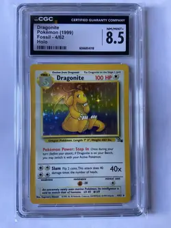 CGC 8.5 Dragonite Pokemon Fossil Unlimited 4/62 Holo Rare 1999 Graded Card - Image 1
