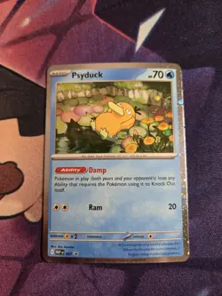 Psyduck (007) Pokemon ME01: Mega Evolution Promo Card Cosmos Holo - Image 1