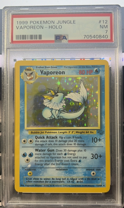 1999 Pokemon Jungle 12/64 - Vaporeon-Holo PSA 7 - Image 1