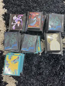 Lot of 34 Assorted Pokemon Sealed ETB Card Sleeves Ascended Charizard Others - Image 1