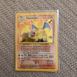 Pokemon BASE Set Unlimited HOLO Charizard 4/102 Crease Damaged - Image 1