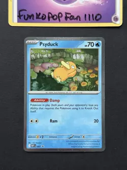 Psyduck MEP Black Star Promo 007 Cosmo Holo Mega Evolution Pokemon Card - Image 1