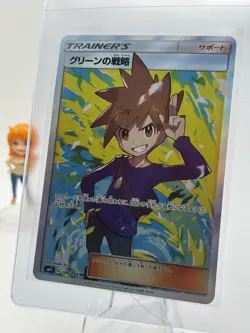 Blue's Strategy - 106/094 - SM11: Miracle Twin (SM11) Pokemon card - Image 1