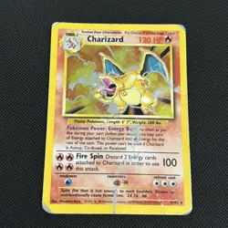 1999 Base Set Charizard #4/102 Holo Unlimited Pokemon Card *Damaged* - Image 1