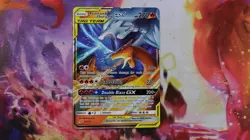 Reshiram & Charizard GX TAG TEAM Ultra Rare Full Art Unbroken Bonds Pokemon Card - Image 1