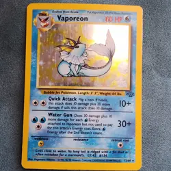 1999 Vintage Pokemon TCG Vaporeon 12/64 Jungle Holographic - Image 1