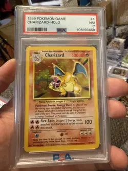 1999 POKEMON BASE SET UNLIMITED #4 CHARIZARD-HOLO PSA 7 - Image 1