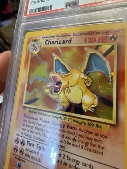1999 POKEMON BASE SET UNLIMITED #4 CHARIZARD-HOLO PSA 7 - Image 3