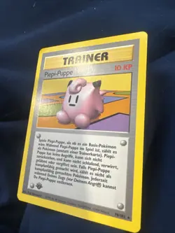 Pokemon TCG 1st Edition German Base Set Piepi-Puppe Trainer 70/102 MP/LP - Image 1