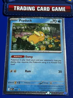 Psyduck (007) Pokemon ME01: Mega Evolution Promo Card Cosmos Holo - Image 1
