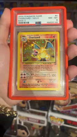 Charizard 4/130 Base Set 2 Rare Holo Pokemon Card 1999-2000 WOTC, PSA 8 - Image 1