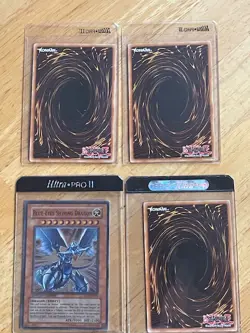 Yugioh Blue-Eyes Shining Dragon MOV-EN001 1996 Limited Edition NM/4 card set - Image 1