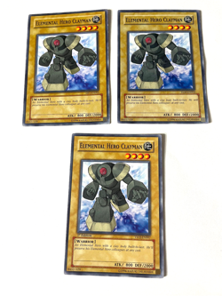 Elemental Hero Clayman - DP1-EN003 / TLM-EN003 / YSDJ-EN007 Common NM Yugioh! X3 - Image 1