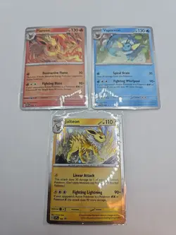 Pokemon TCG: Prismatic Evolutions Poster Collection Cosmos Holo Promos Set of 3 - Image 1